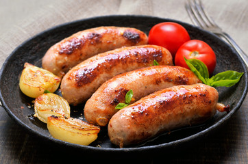 Grilled sausages and vegetables