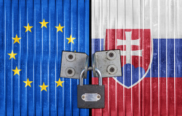 EU and Slovakia flag on door with padlock