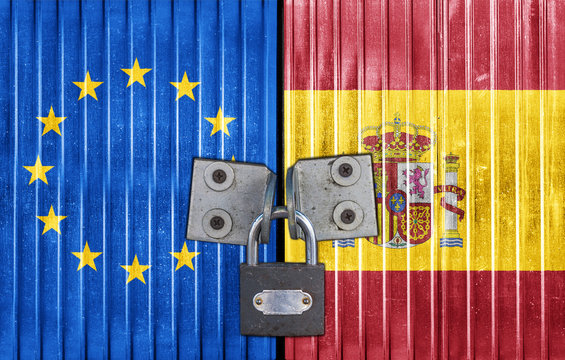EU and Spain flag on door with padlock