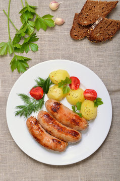 Fried sausages and vegetables
