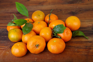 Tangerine citrus fruit mandarin on wooden background