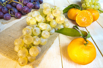 white raisin grapes on a wooden background