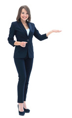 Happy  young beautiful business woman showing blank area for sig