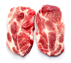 Two pieces of crude meat.
