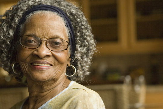 Portrait of an elderly African American woman at home.