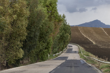 Postcard from Sicily, landscape view with heavy storm clouds