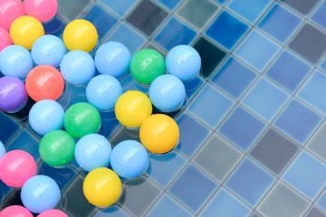 ball floating in swimming pool..