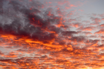 Fototapeta na wymiar Dark fire red clouds
