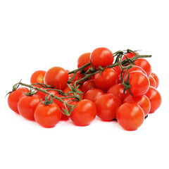 Red tomatoes on a branch isolated on white background