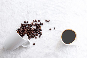 Coffee cup and beans on a white background...