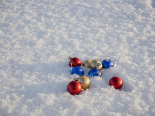 Christmas decorations in the snow 
