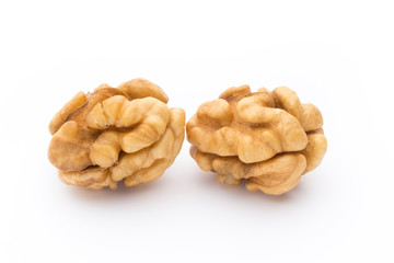 Walnut and walnut kernel isolated on the white background.