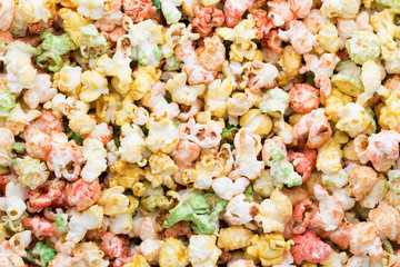 Colored Popcorn texture background. Sweet popcorn.