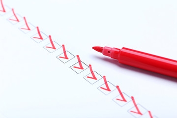 Check boxes on white paper