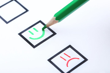 Check boxes on white paper