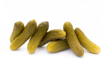 Marinated pickled cucumbers isolated on the white.