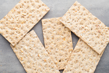 Stack of wholegrain crispy bread with sunflower, chia and sesame