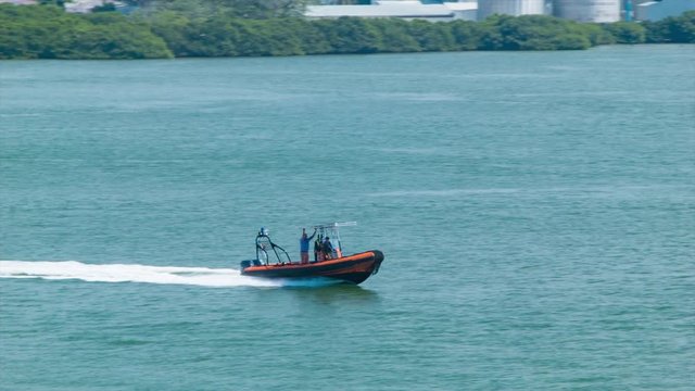 Cartagena Colombia Customs and Security Boat with Officials Speeding Through the Central American Harbor