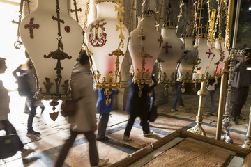 Pilgrims pass the Stone of Unction, Church of the Holy Sepulchre, Old City, Jerusalem, Israel