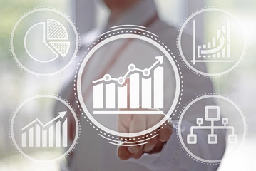 Businessman in white shirt and badge selects one of the multiple graphs. Businesswoman presses...