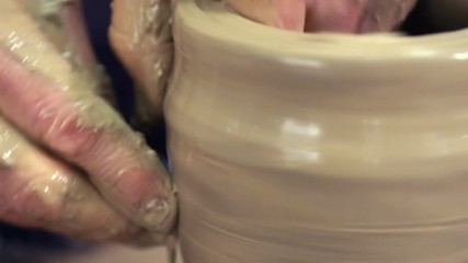 Potter special tools handles clay, master kneads the clay.