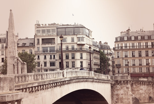 Bridge over the Seine River and buildings in Paris