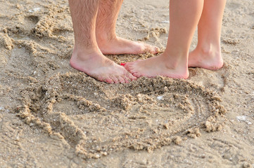 Romantic couple kissing on the beach