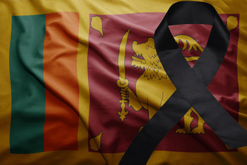 flag of sri lanka with black mourning ribbon