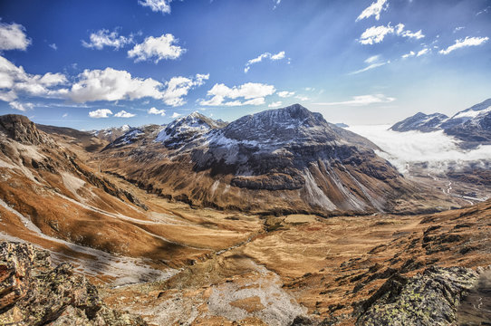 Blue sky and autumn colors, Fain Valley, Engadine, Canton of Grisons (Graubunden)