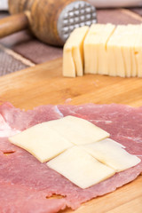 Pork chop stuffed with yellow cheese