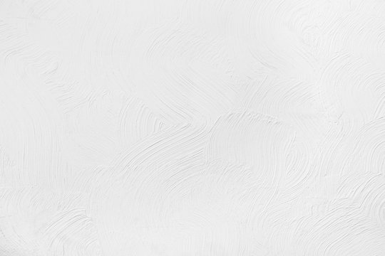 white wall with a pattern on the plaster. Texture, background
