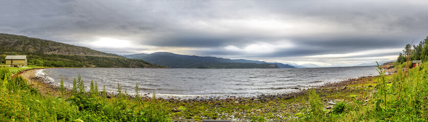 Scandinavian northern nature. Beautiful view on Jiepmaluokta  bay in the municipality of Alta in Norway. In Sami language the name Jiepmaluokta is "bay of seals"