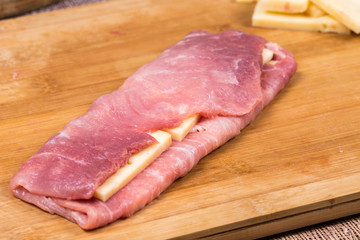 Pork chop stuffed with yellow cheese