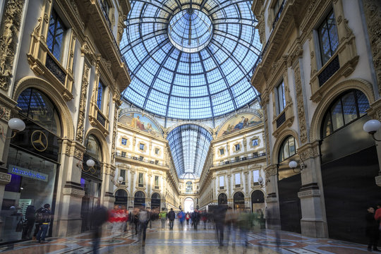 The shopping arcades and the glass dome of the historical Galleria Vittorio Emanuele II, Milan, Lombardy