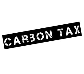 Rubber stamp with text carbon tax