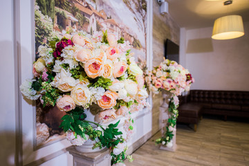 Beautiful flower decorations at restaurant on wedding