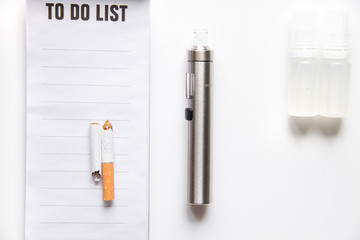 elimination of tobacco smoking electronic cigarette white background top view
