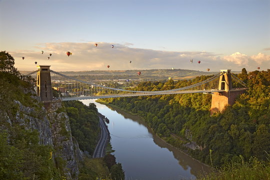 Clifton Suspension Bridge with hot air balloons in the Bristol Balloon Fiesta in August, Clifton, Bristol