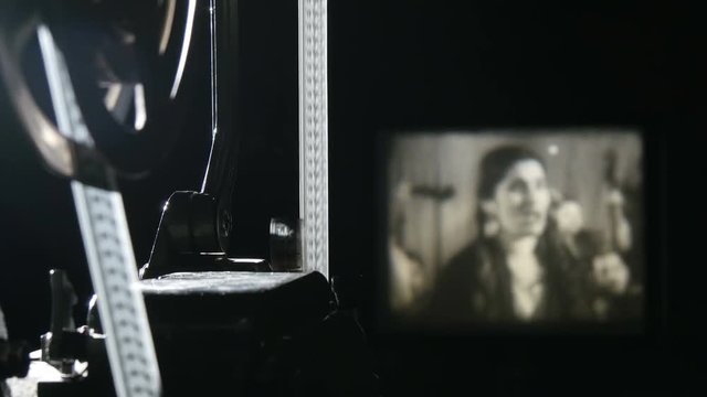 vintage film projector shows film, close-up