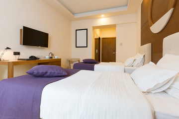 Fototapeta na wymiar Modern new hotel bedroom interior