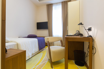 Interior of a new hotel double bed bedroom