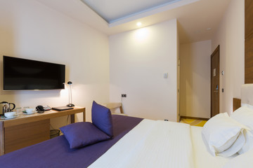 Interior of a new hotel double bed bedroom