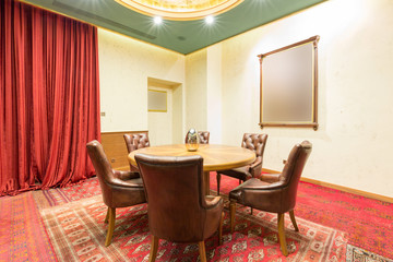Wooden table in hotel lobby cafe