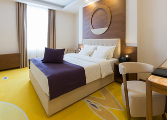Interior of a new hotel double bed bedroom