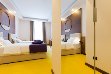Interior of a new hotel double bed bedroom
