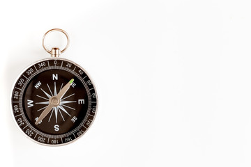 compass on white background concept - direction motion top view