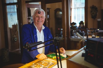 Portrait of smiling horologist