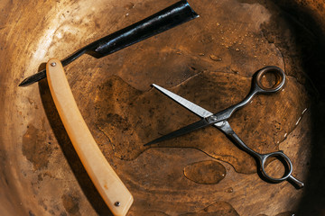 Vintage razor and hair scissors
