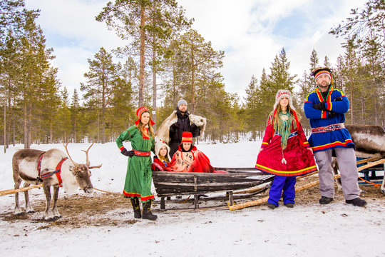 Group photo wearing Traditional Sami costumes, Reindeer Safari, Kakslauttanen Igloo Village, Saariselka, Finland