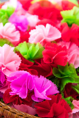 Wrapping coins colorful petals.